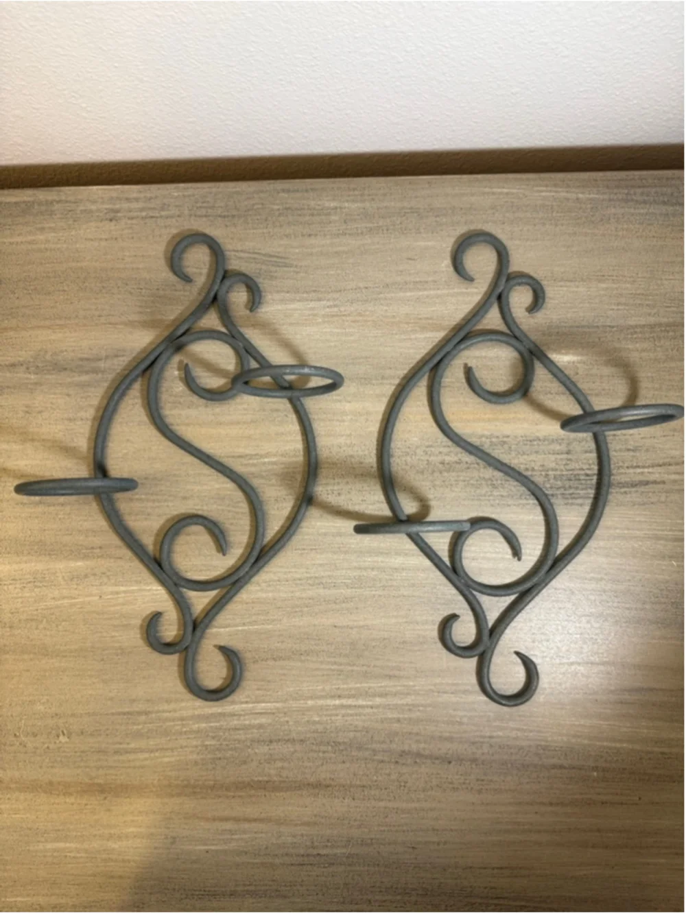 set of two scrollwork metal wall sconces approx 13x9”